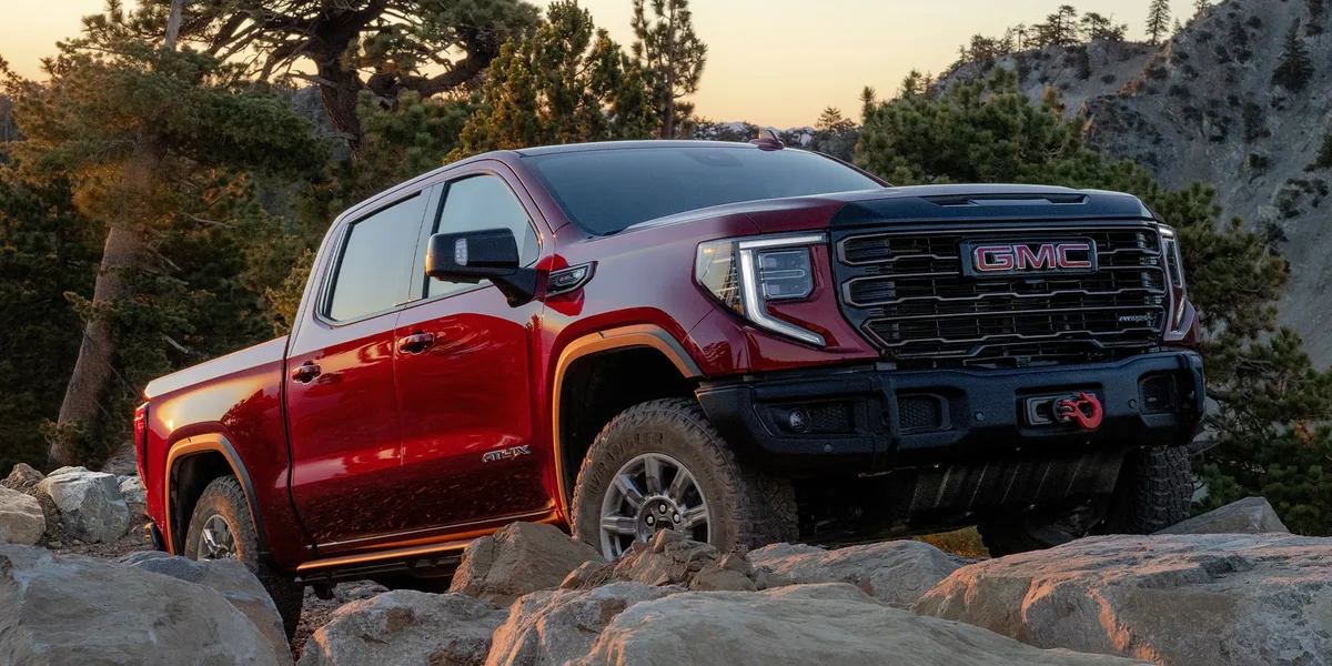 2026 GMC Sierra 1500 Pickup Truck Driving Over Rough Terrain