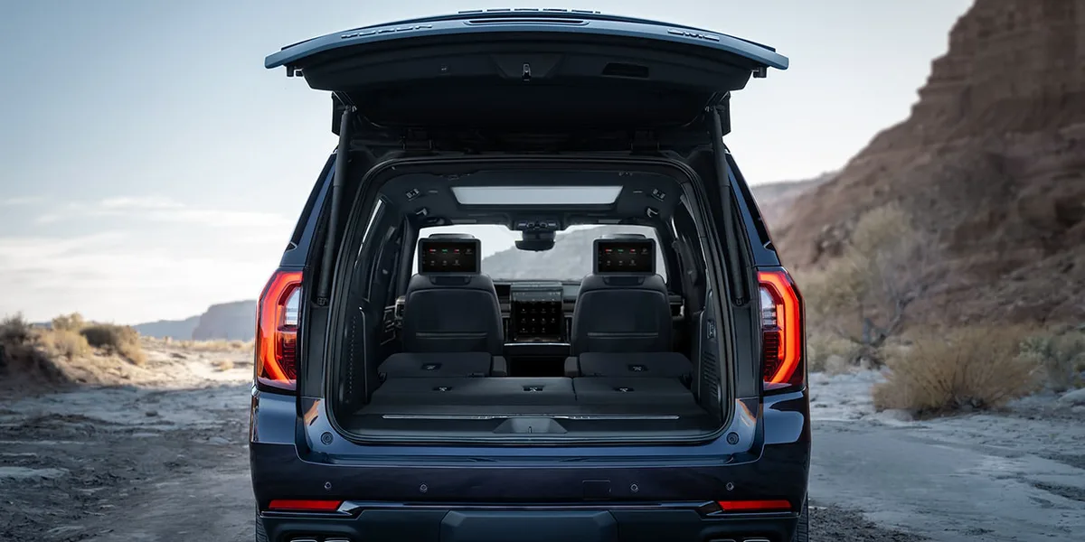 Exterior Rear View of the Open Tailgate Displaying the Cargo Space in the 2026 GMC Yukon